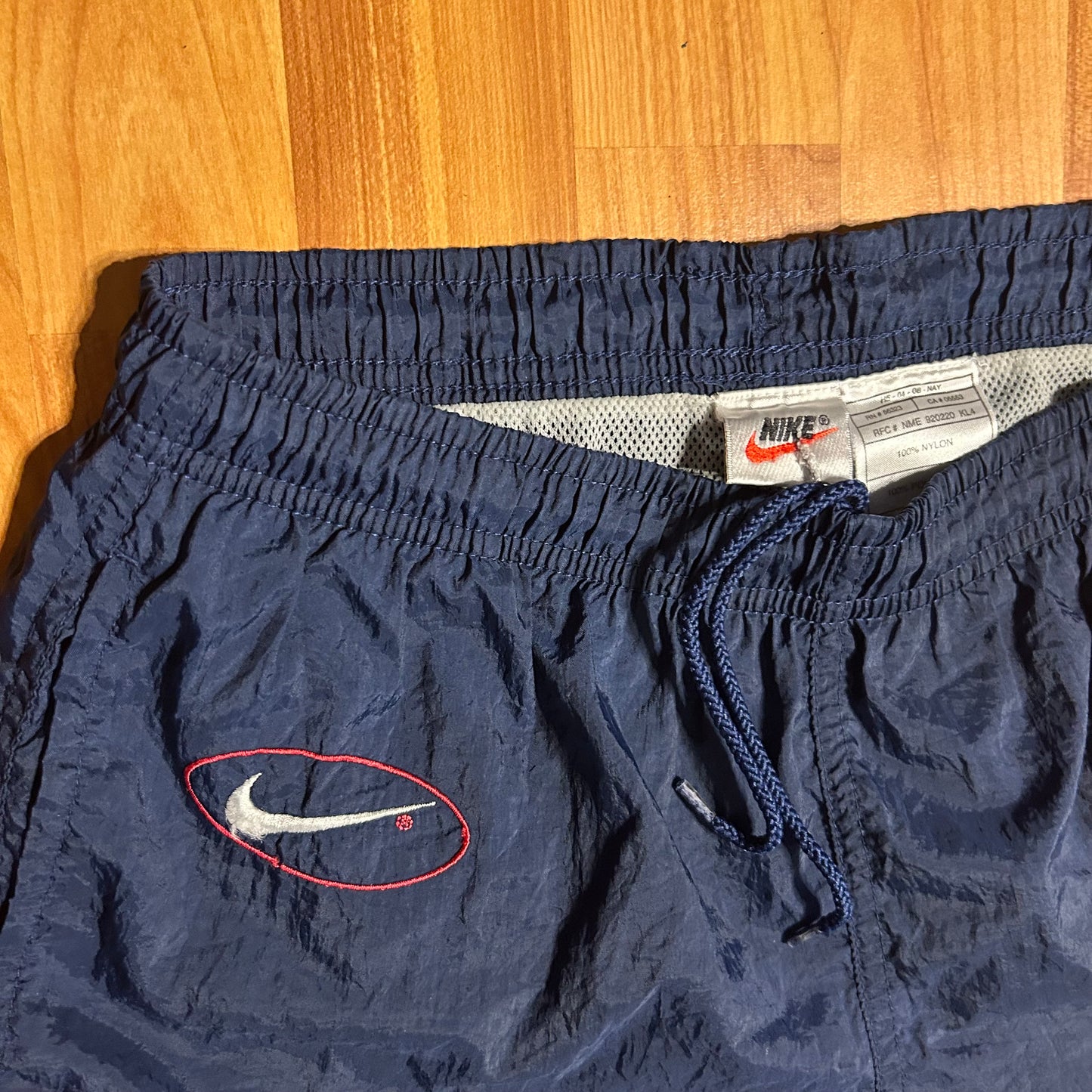 90's Nike Nylon Navy Shorts - 26” x 4.5”