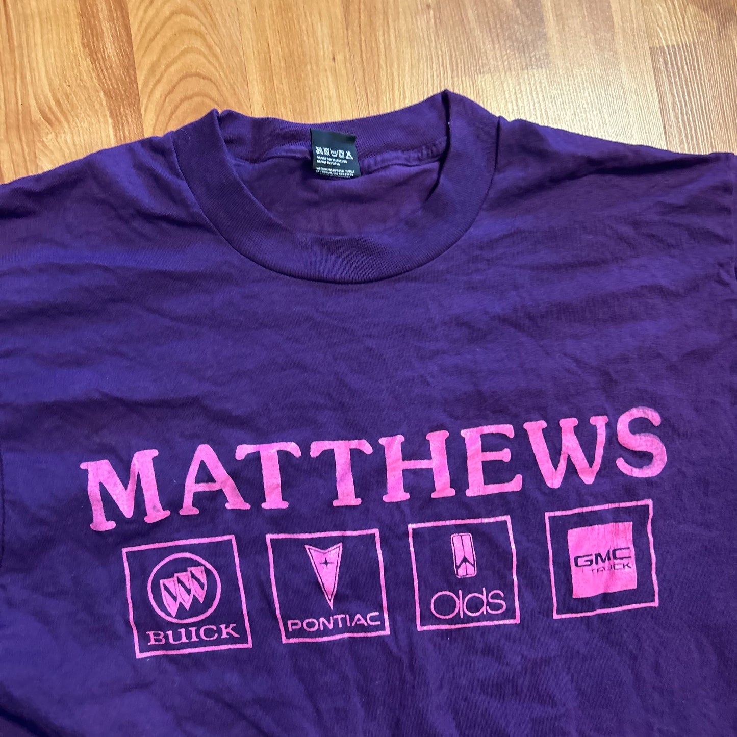 90's Screen Stars Matthews Buick Pontiac Olds GMC Purple Cars Tshirt - Medium - 21" x 29"