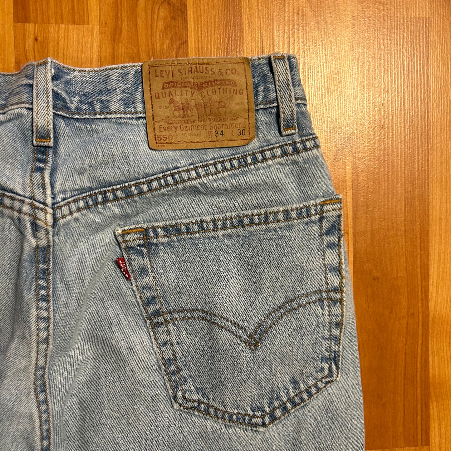 90's Levis 550 Distressed Light Wash Denim Blue Jeans - 32" x 30"
