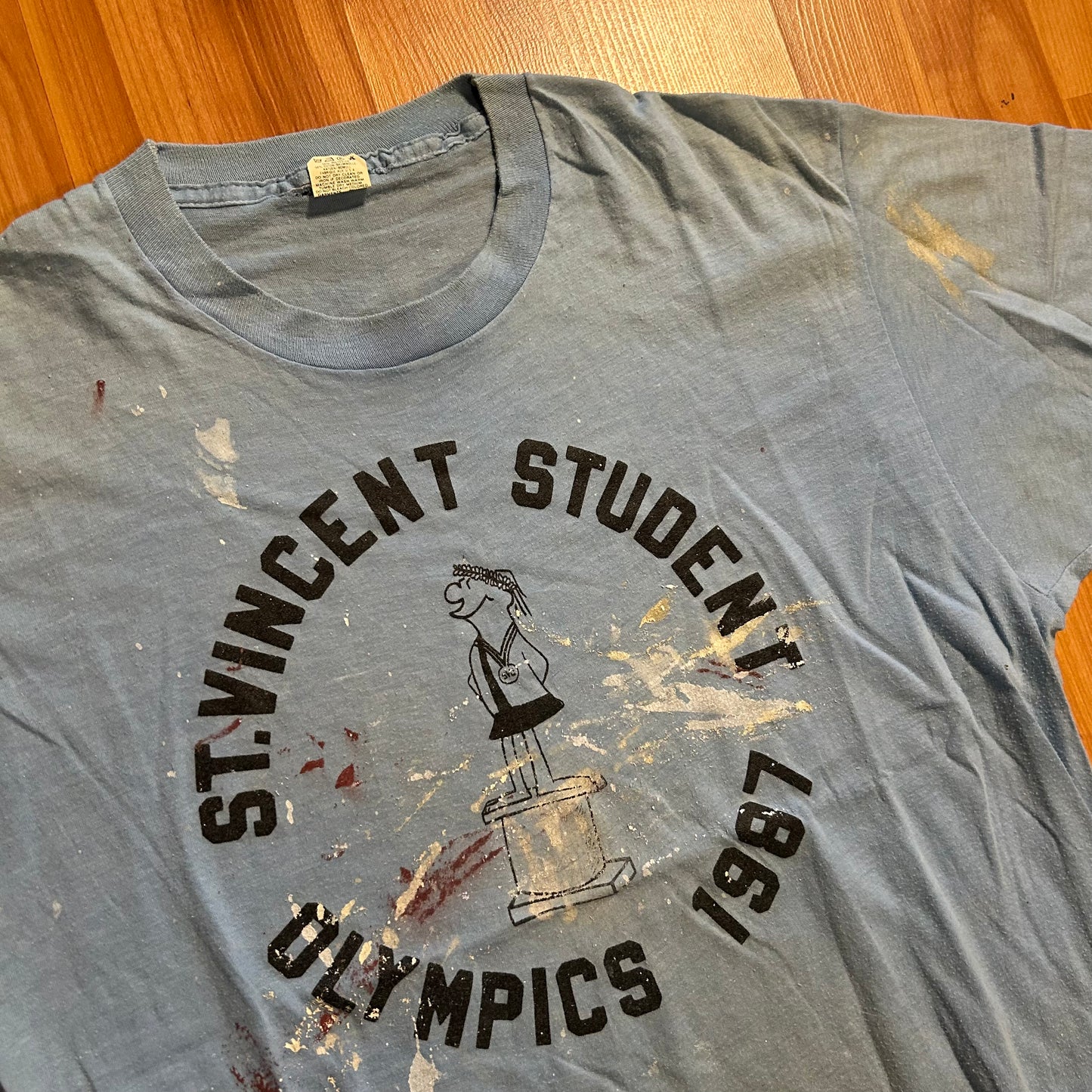 80’s Screen Stars St Vincent Student Olympics 1987 Light Blue Painter Tshirt - Small - 19" x 27"