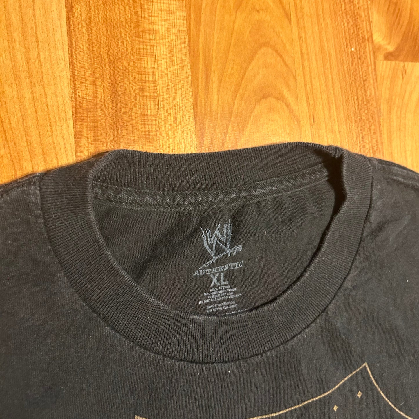 WWE Authentic Wear RKO Strike First Lion Black Cotton Tshirt - Large - 23" x 30"